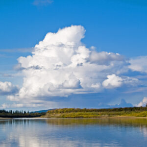 Clouds tower over the arctic's Kobuk River.