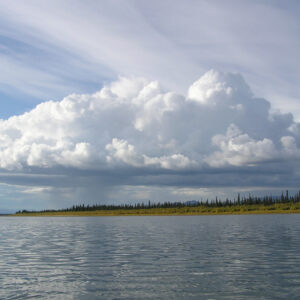 A cumulus cloudscape over arctic Alaska's Kobuk River.