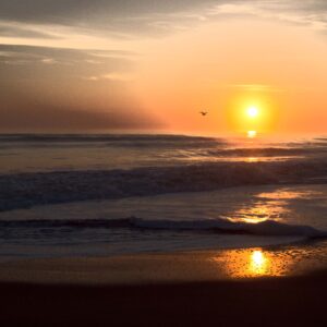 Sunrise reflected on Nags Head beach in North Carolina.